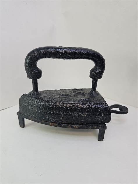 Vintage Cast Sad Iron And Trivet Doorstop Primitives Etsy