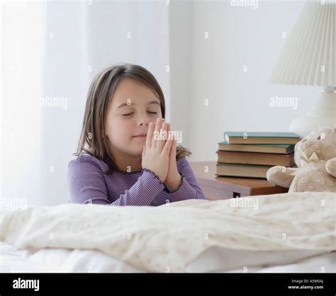 Child praying bed hi-res stock photography and images - Alamy