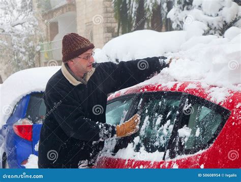 Man Cleaning His Car From Snow Editorial Stock Image Image Of