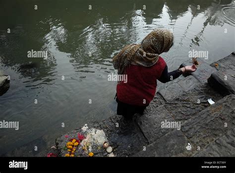 A Hindu Devotee Praying At Pashupatinath Temple A Hindu Shrine And One