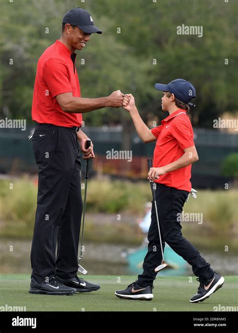 Tiger Woods And His Son Charlie Fist Bump After Completing The Final