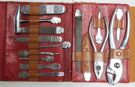 An Earlymid 20th Century German Tool Set Within A Brown Leather