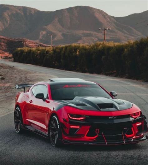 Red Chevrolet Camaro On The Road