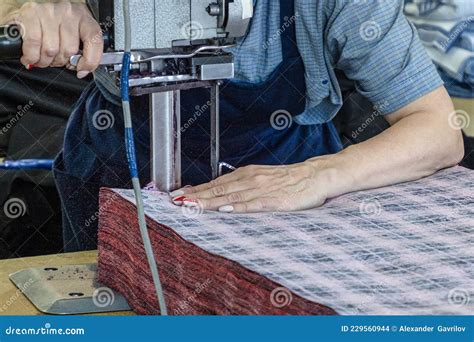 A Man Uses An Electric Air Blower To Dry A Cleaned And Washed Window