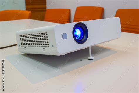 projector for presentation in a meeting room (Light in a light yellow tone room.) Stock Photo ...