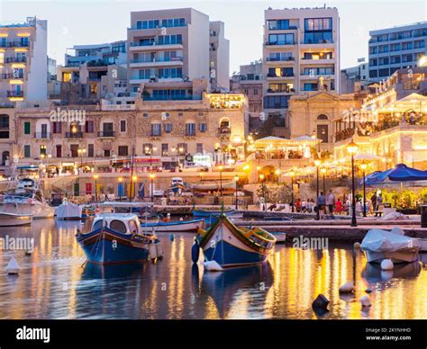 St Julian Malta May 2021 Spinola Bay With Plenty Of Colorful Boats