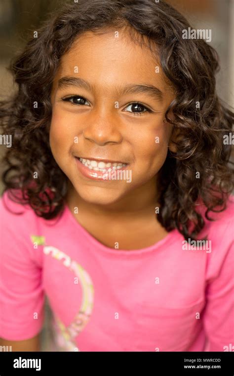 Cute hispanic little girl smiling Stock Photo - Alamy