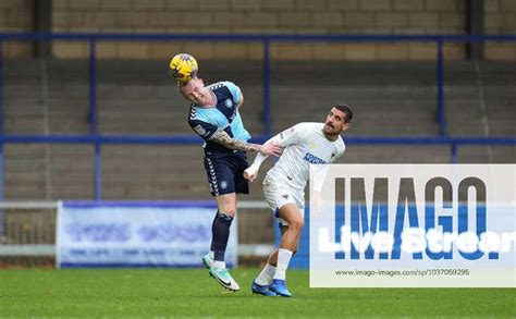 Jack Grimmer Of Wycombe Wanderers And Omar Bugiel Of Afc Wimbledon