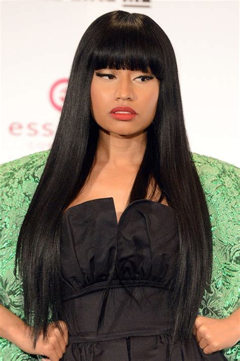 Nicki Minaj Straight Black Blunt Bangs, Choppy Layers, Flat-Ironed Hairstyle | Steal Her Style