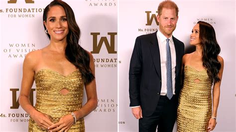 Meghan Markle All Smiles In Gold Gown Alongside Prince Harry For Post