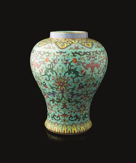 A LIME GREEN GROUND FAMILLE ROSE MEIPING VASE JIAQING SEAL MARK AND OF