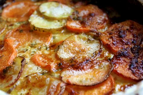 Scalloped Yukon Gold And Sweet Potato Gratin With Fresh Herbs A Feast