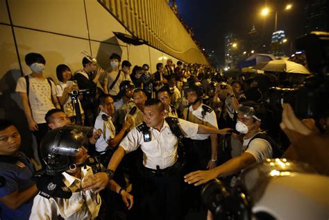 Tensions Rise After Hong Kong Police Beat Handcuffed Pro Democracy