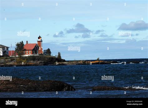 Eagle Harbor Lighthouse Sends Out Its Beam Of Searching Light Across