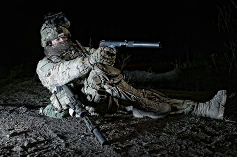 A Member Of Ukraines Special Operations Forces With A Suppressed