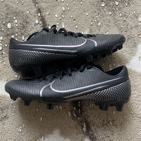 Nike soccer cleats. Black with purple and greenish... - Depop