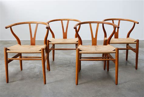 Set Of Four Oak Ch24 Wishbone Chairs By Hans J Wegner For Carl