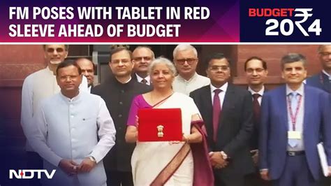 Budget Nirmala Sitharaman Poses With Tablet In Red Sleeve Ahead