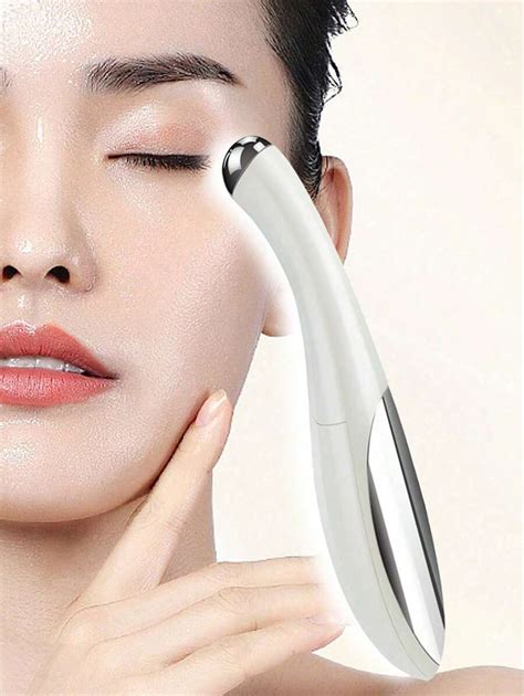 Stylo de massage des yeux électrique pour la réduction des cernes et