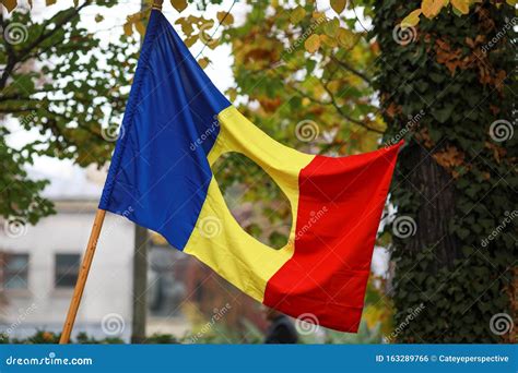 Details With The Romanian Flag With A Hole The Symbol Of The Romanian