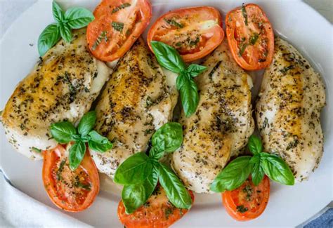 Spinach Mozzarella Stuffed Chicken With Roasted Tomatoes Babaganosh