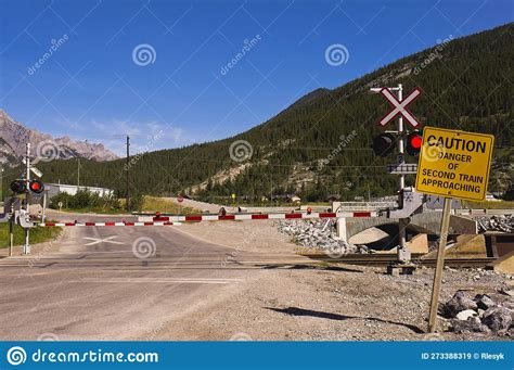 Railroad Crossing Arms and Caution Sign Stock Image - Image of sign, crossing: 273388319