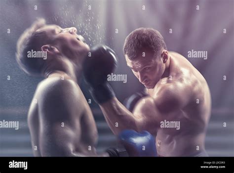 Two Professional Boxers Fighting In The Ring Stock Photo Alamy