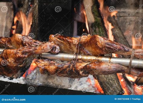 Grilled Roasted Mutton Meat On Spit At Street Food Market Stock Photo