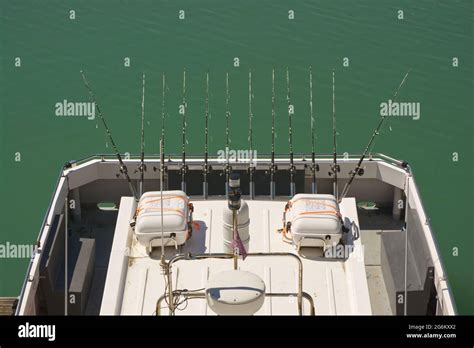 Fishing Rods On Stern Of Boat At Marina Brighton East Sussex England