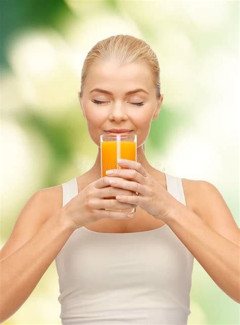 Young Woman Drinking Orange Juice Stock Photo Image Of Cheerful