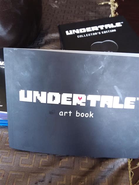 I finally got my undertale artbook! Took a bit of time to arrive but ...