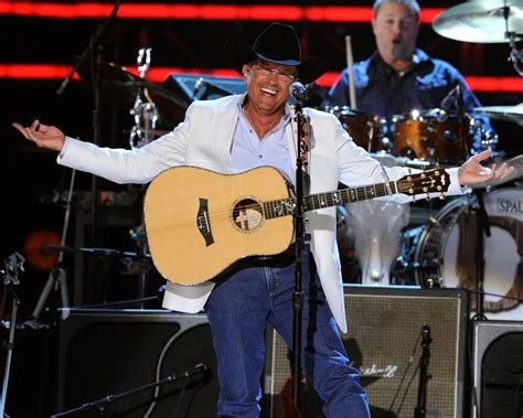 Win A Guitar Signed By George Strait