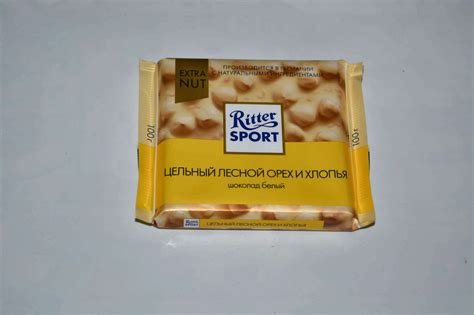 Шоколад Ritter Sport Extra Nut белый ЛЕСНОЙ ОРЕХ И ХЛОПЬЯ 100 г ...