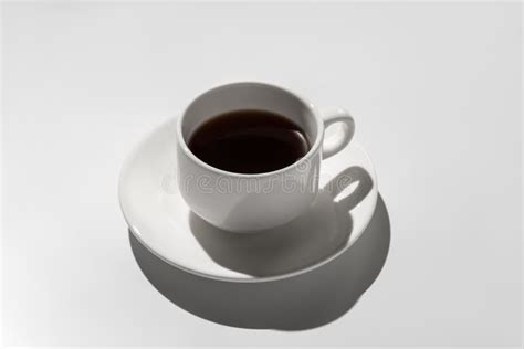 White Coffee Cup With Espresso Hard Shadows On Gray Background Stock