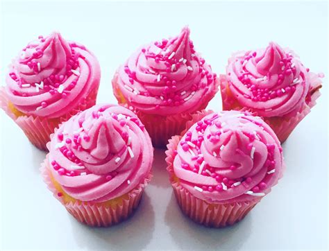 Vanilla Cupcake With Strawberry And Cream Floured Buttercream Topped With