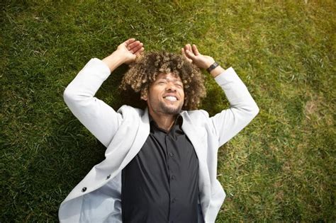 Premium Photo Relaxed African American Man Entrepreneur Lying On