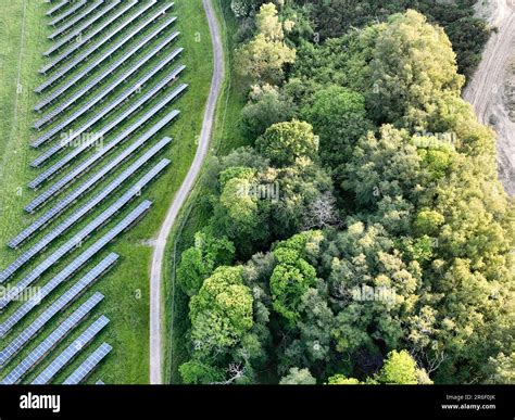 A Large Scale Solar Farm Set In A Countryside Environment Stock Photo