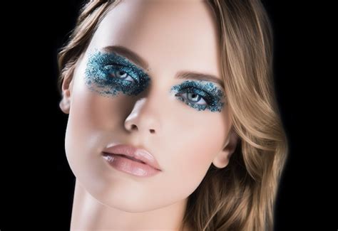 Premium AI Image | Portrait of the beautiful girl with blue glitter ...