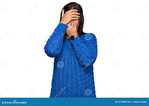 Young Hispanic Woman Wearing Casual Clothes Covering Eyes And Mouth