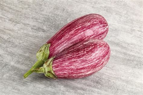 Premium Photo Two Ripe Purple Graffiti Eggplant For Cooking