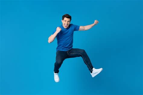 Premium Photo American Man Jumping And Enyoying His Success