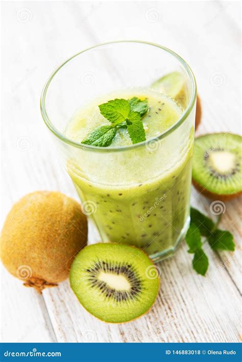 Glass Of Kiwi Smoothie With Fresh Fruits Stock Photo Image Of Liquid