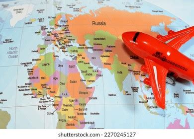 Colorful World Map Airplane On Continents Stock Photo