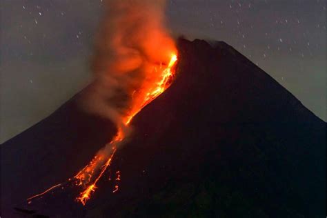 Indonesia's Merapi volcano erupts, spews hot lava