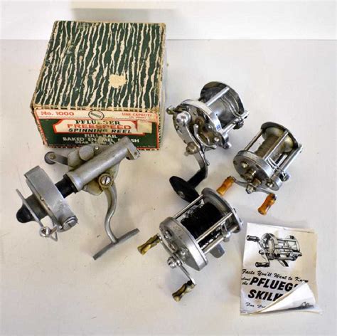 FIVE VINTAGE PFLUEGER FISHING REELS