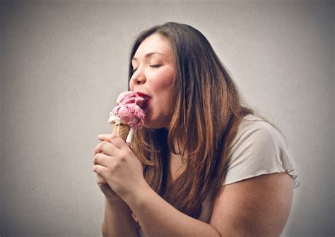 Premium Photo Happily Eating Ice Cream