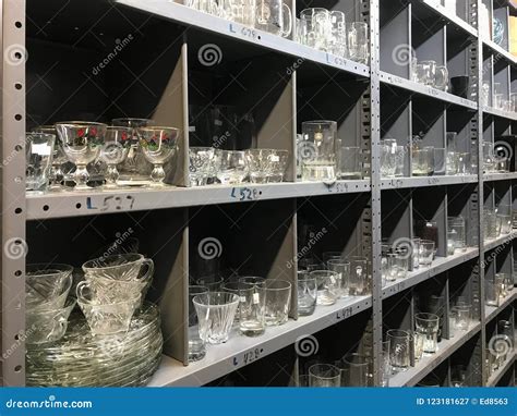 Shelves Of Used Clear Glassware Dishes In Thrift Shop Stock Image Image Of Glassware Border