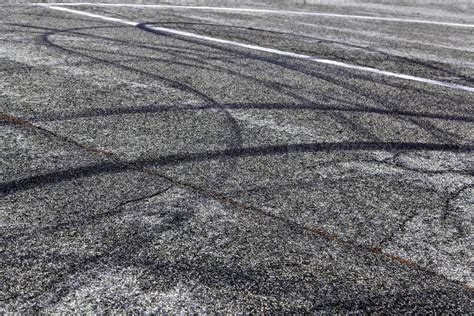 Tire marks on the asphalt 17535328 Stock Photo at Vecteezy