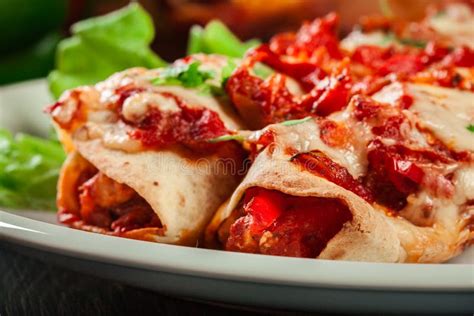 Traditional Mexican Enchiladas With Chicken Meat Spicy Tomato Sauce