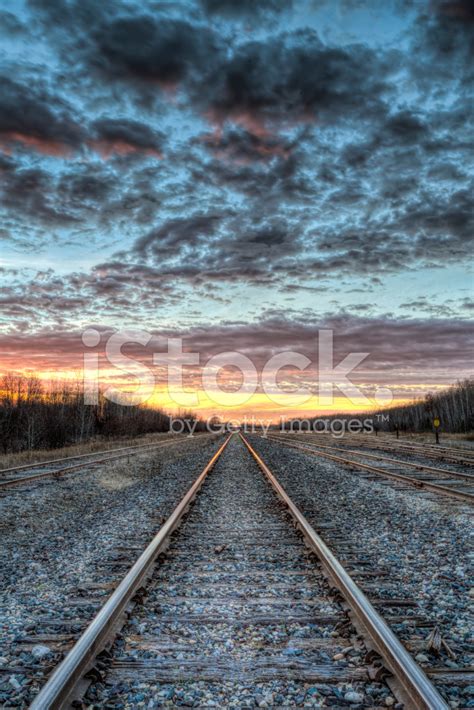 Railroad Tracks At Sunset Stock Photo | Royalty-Free | FreeImages